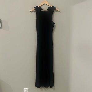 Twenty Montreal Black Cocktail Dress with open back and ruffled bottom
